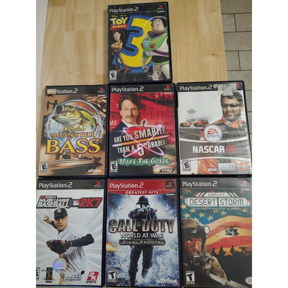 Playstation 2 Lot 7 Games W/Cases Call Of Duty Monster Bass Desert Storm Nascar